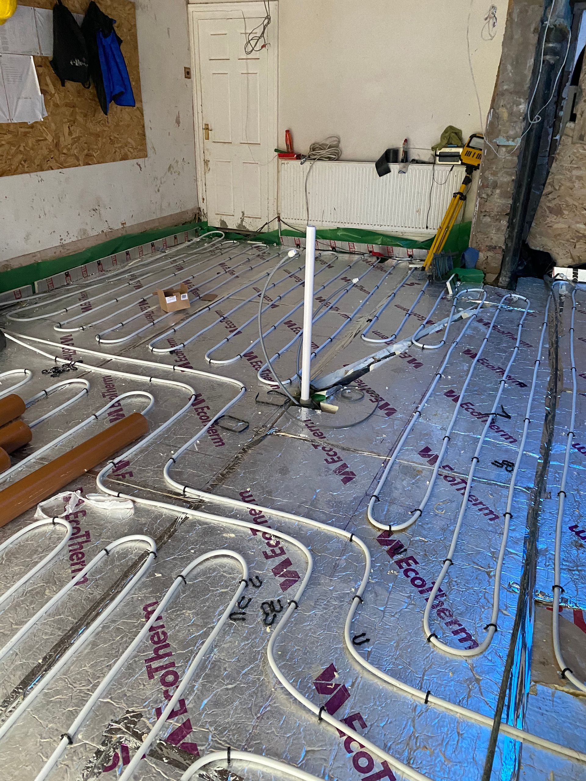 Precision underfloor heating (UFH) layout by Ibex Builders for a Walthamstow E17 home.