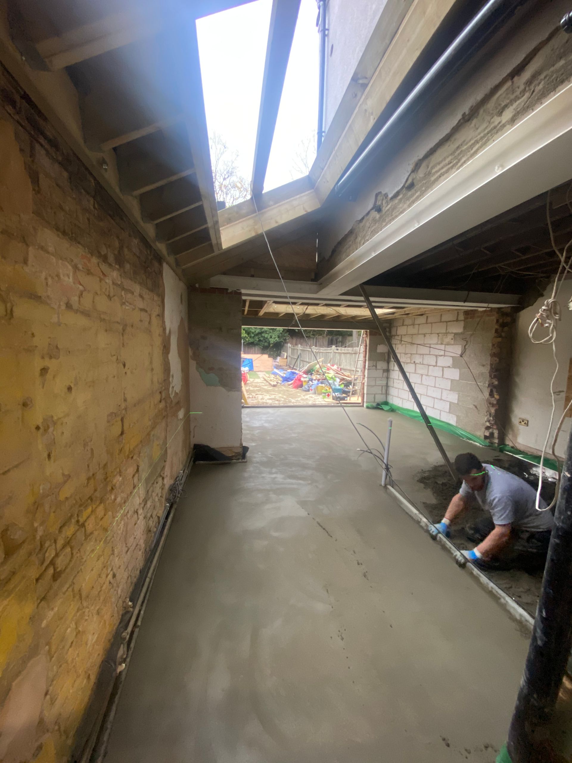 Interior structural view of a roof lantern and timber joists in a Walthamstow extension by Ibex Builders.