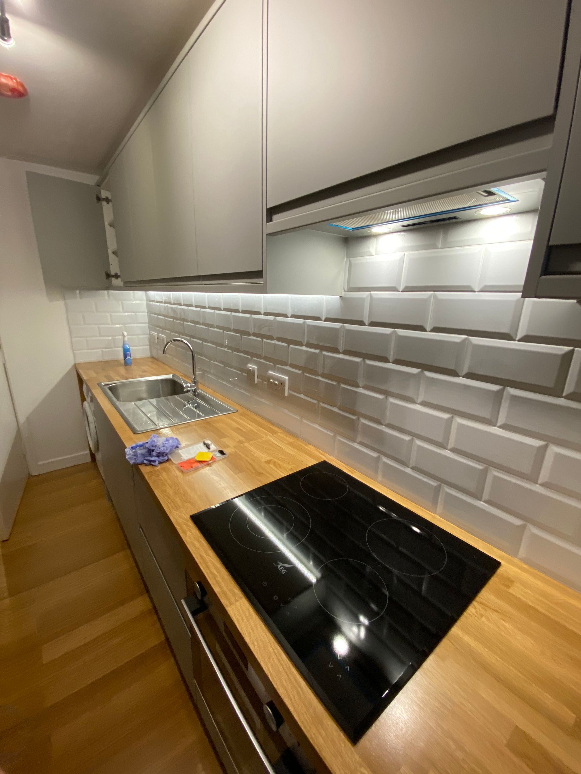 New kitchen, wood flooring, and window