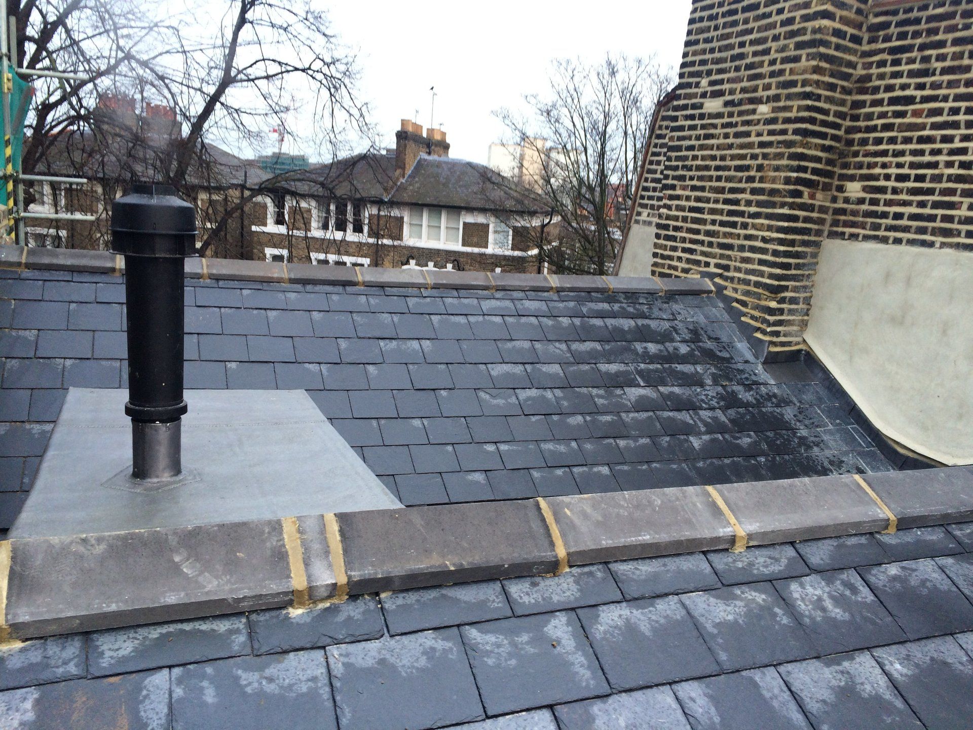 New roof replacement and Brick pointing  London 