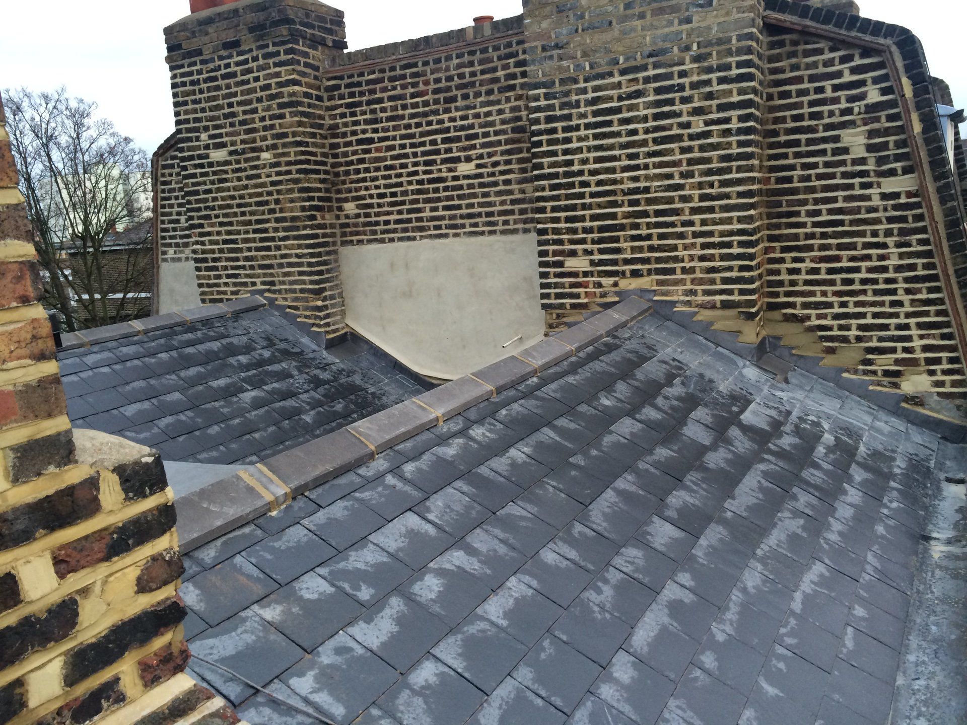 New roof replacement and Brick pointing  London 