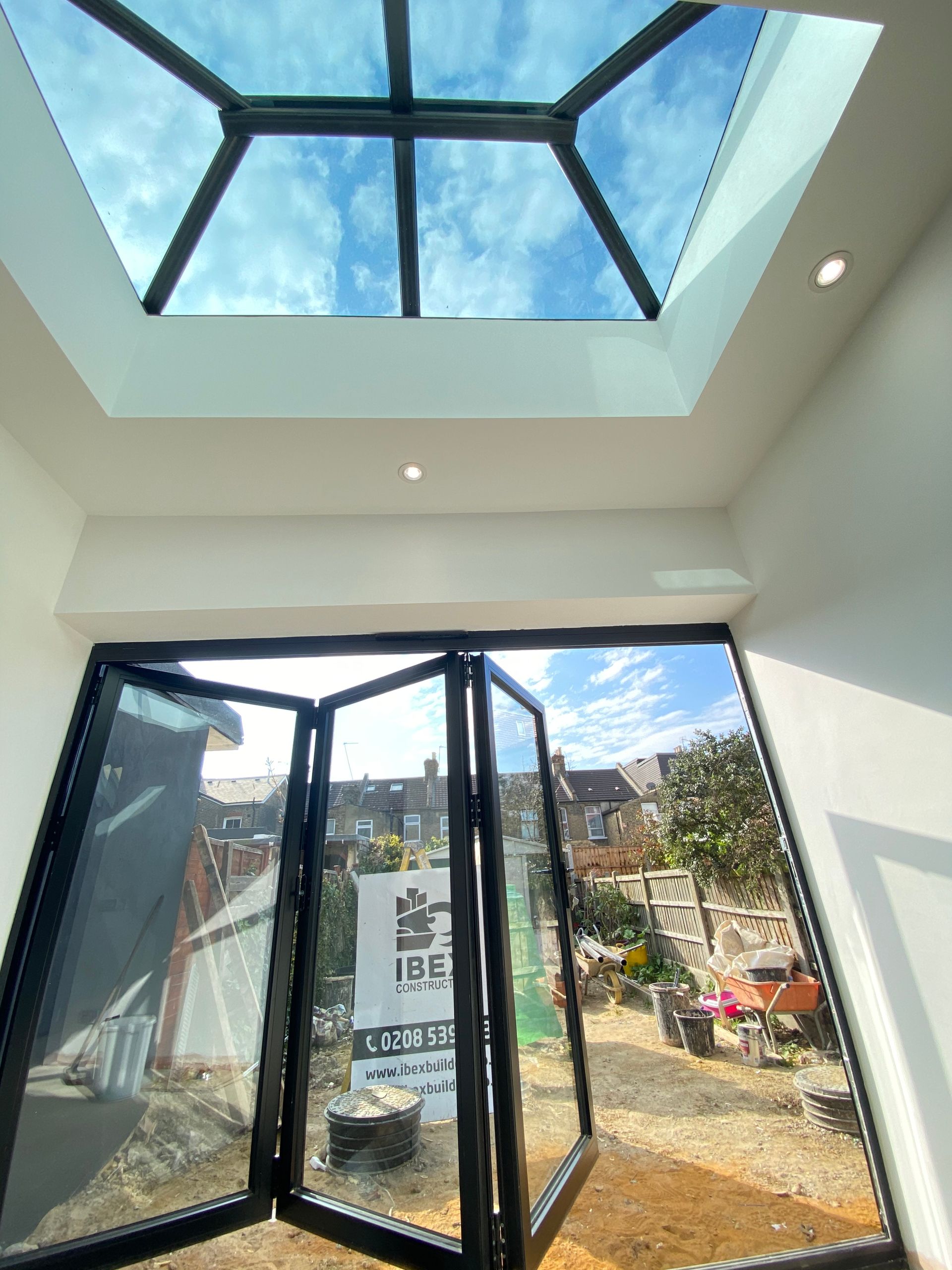Modern roof lantern providing light in a Leytonstone E11 kitchen extension by Ibex Builders.