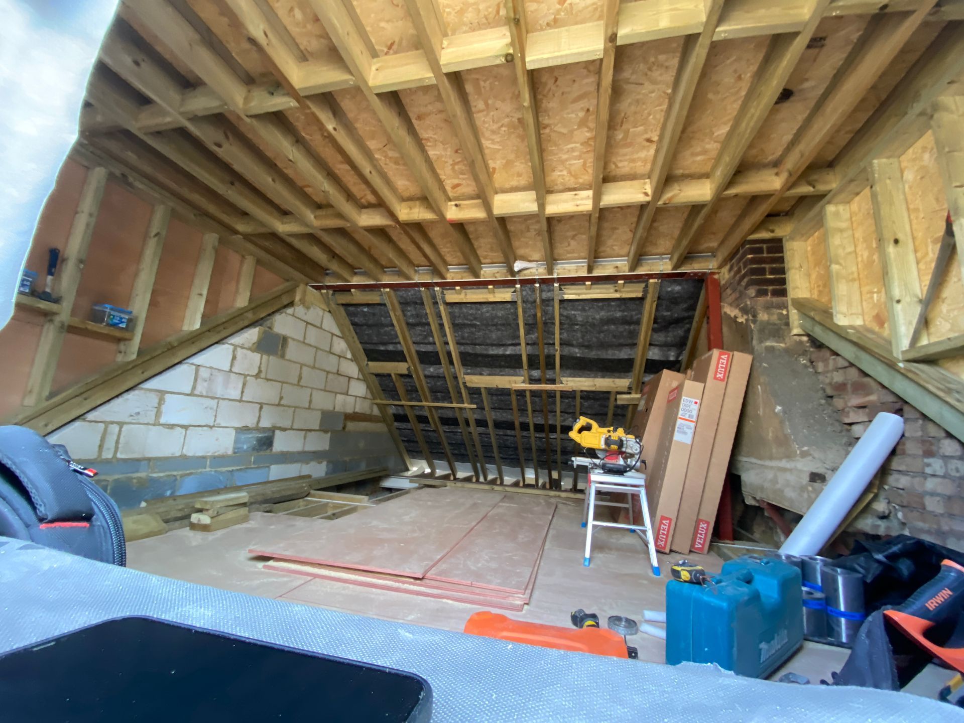 Spacious attic transformation by Ibex Builders featuring expert structural timber and blockwork.