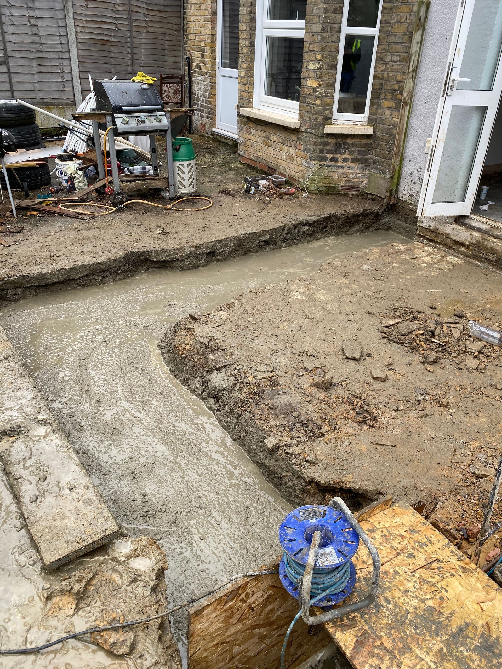 Ibex Builders digging foundation trenches for a rear kitchen extension in Walthamstow E17.