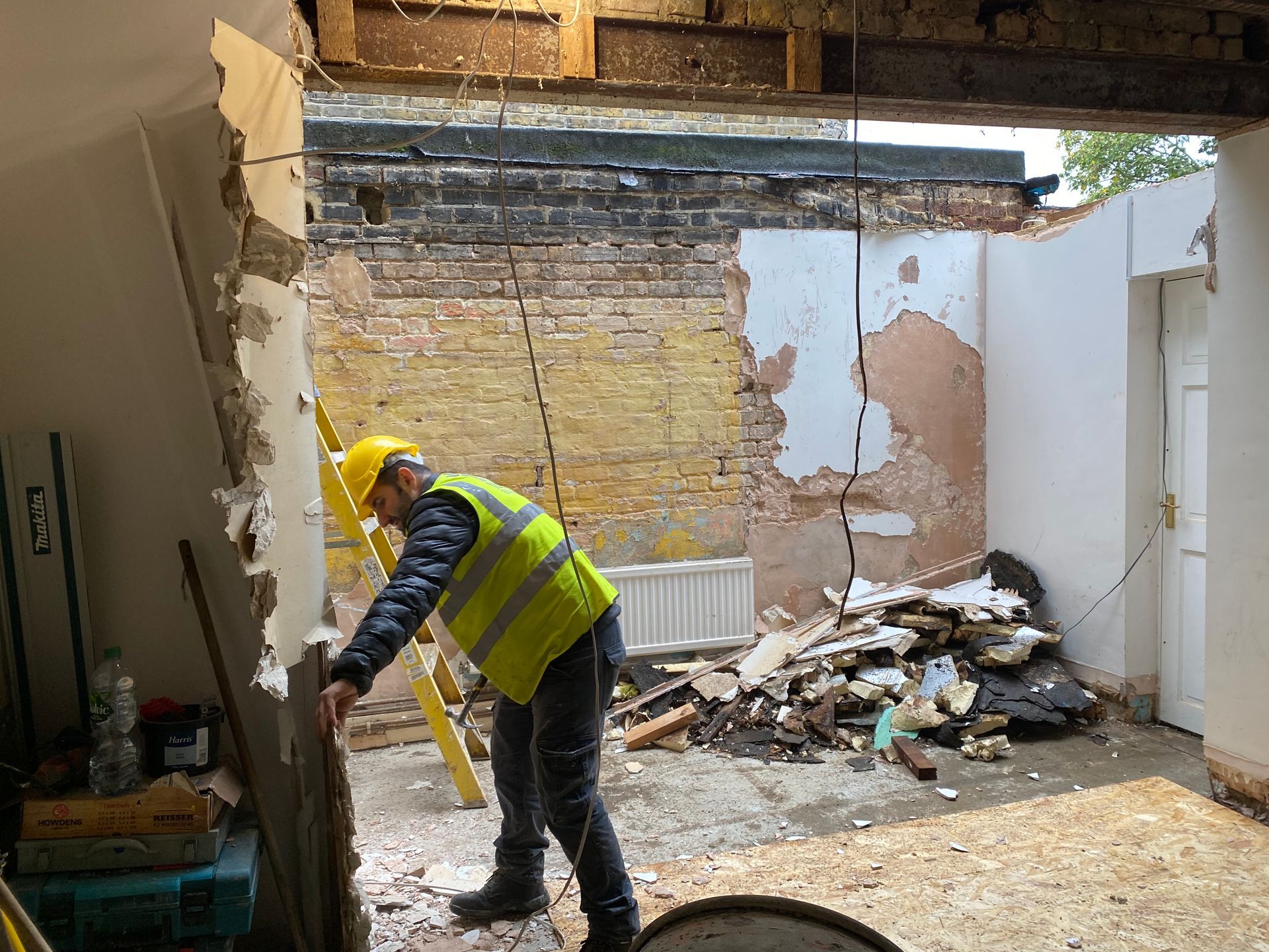 Ibex Builders team member preparing internal walls for a kitchen extension in Walthamstow E17.