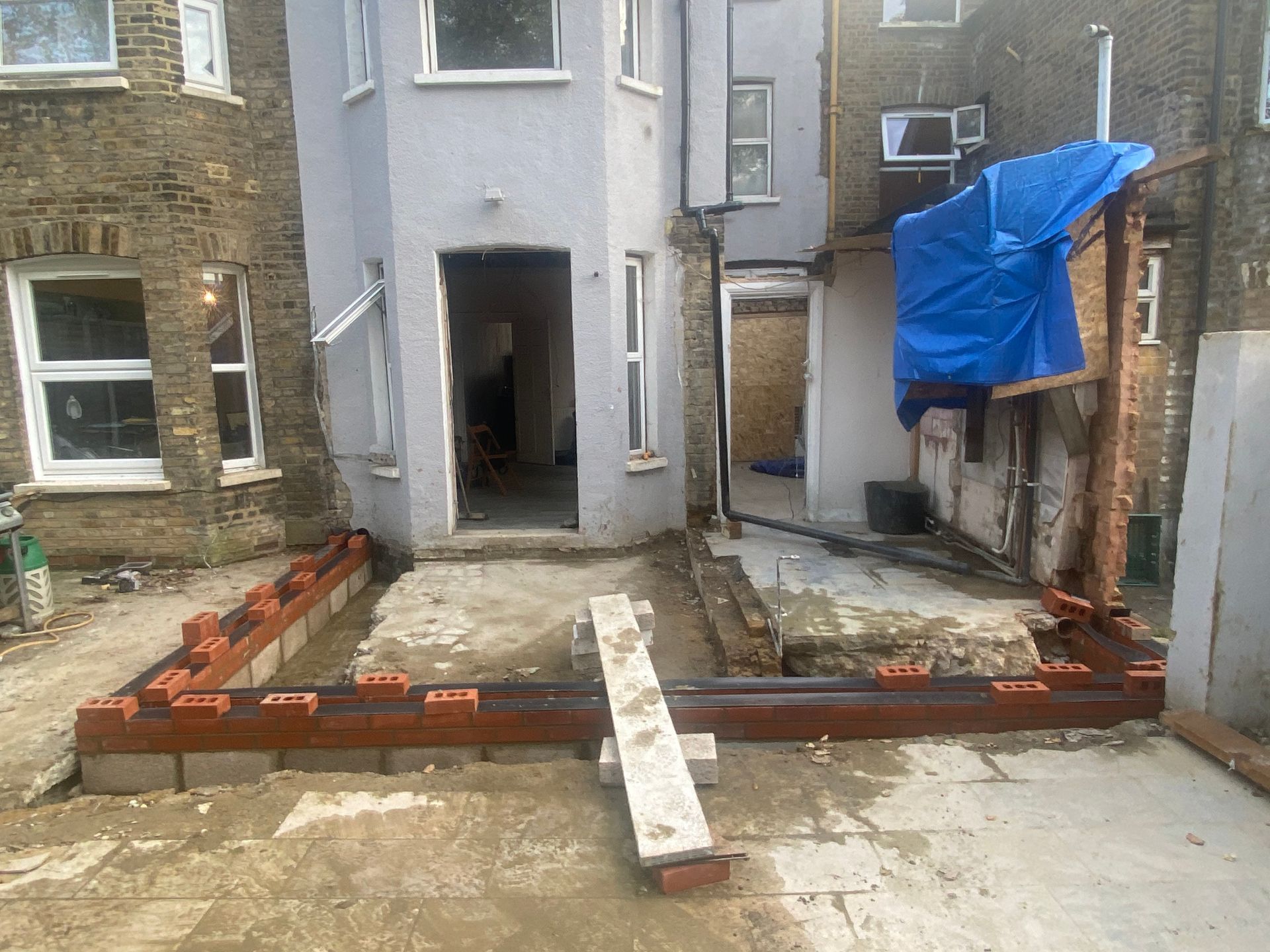 Structural steel and brickwork in progress for a Walthamstow kitchen extension by Ibex Builders.