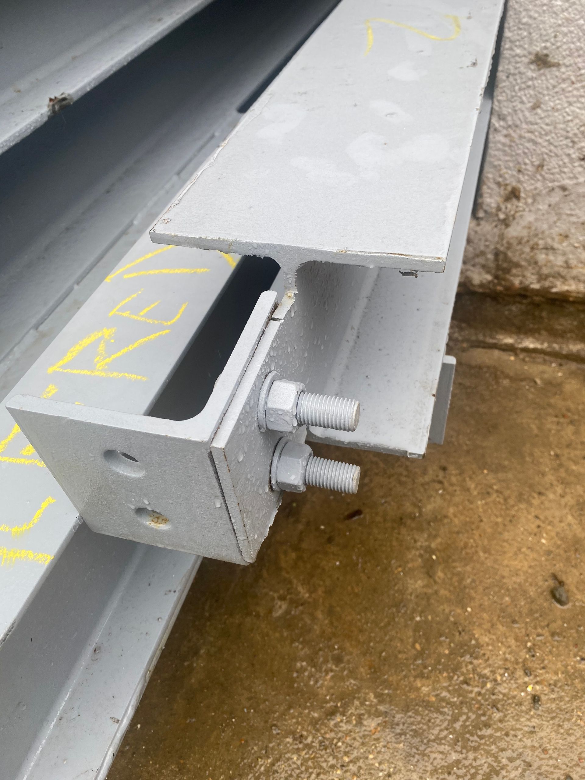 Close-up of precision steel joinery by Ibex Builders for an E17 kitchen extension.