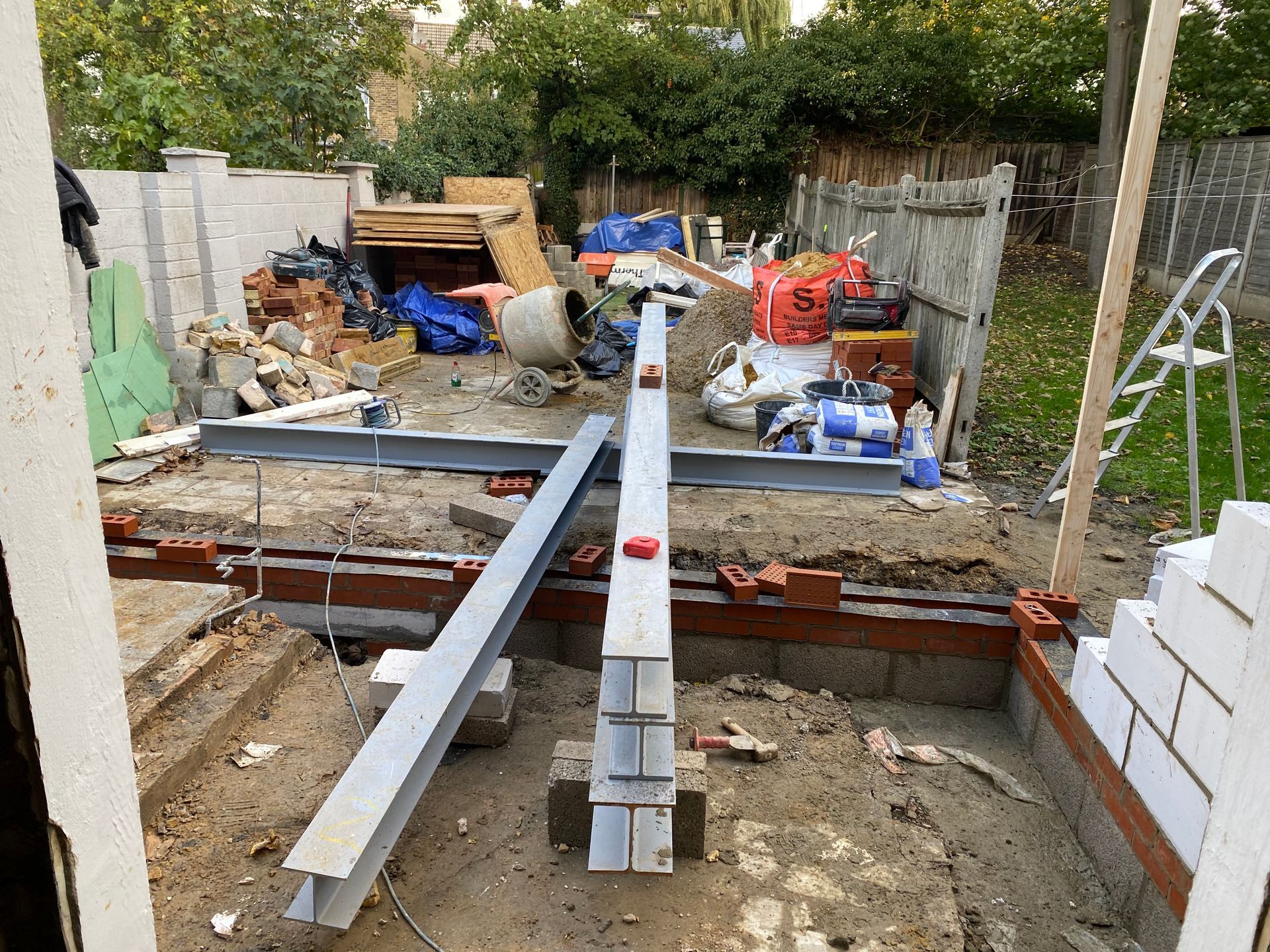 Structural steel beams on-site for an E17 kitchen extension project by the Ibex Builders team.