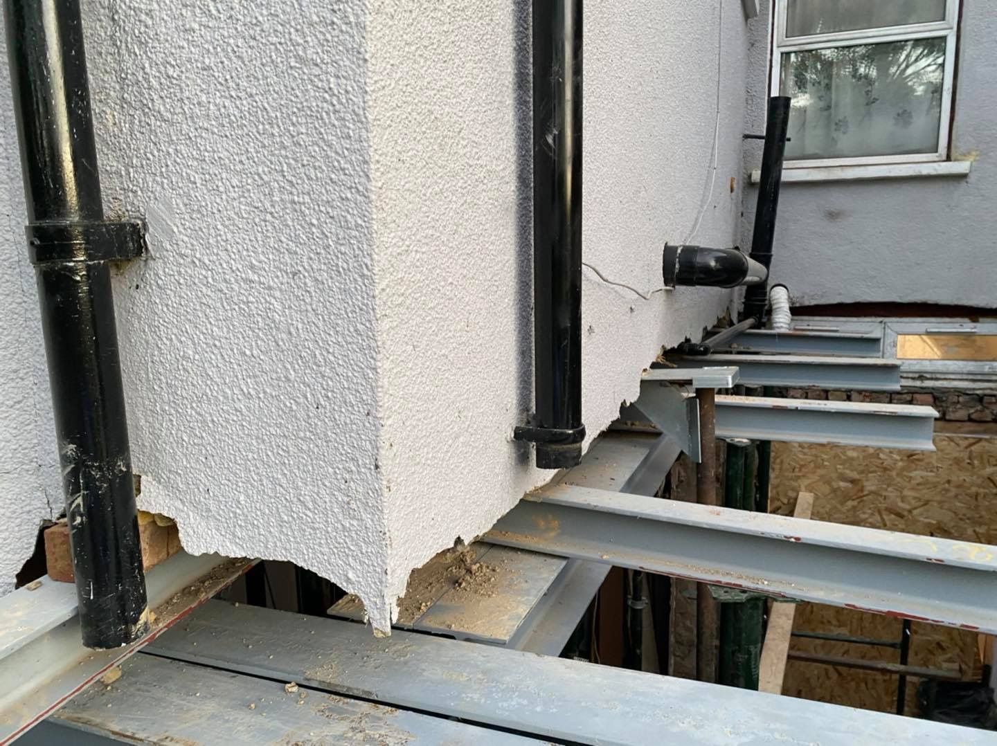 Detailed steel beam installation by the Ibex Builders team for a Walthamstow extension.