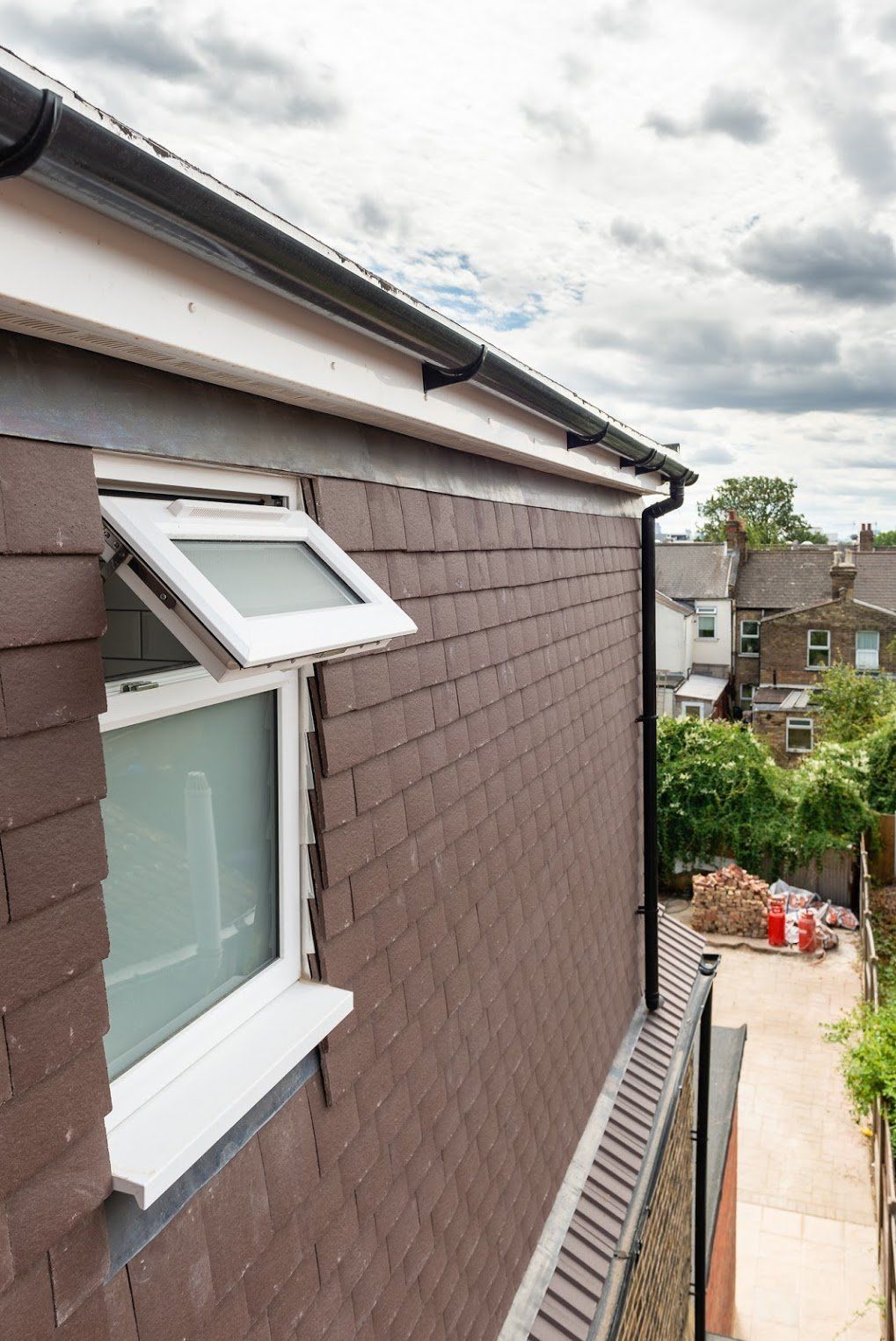 Tiled roof detail of a new kitchen extension and loft conversion in Walthamstow E17 by Ibex Builders.