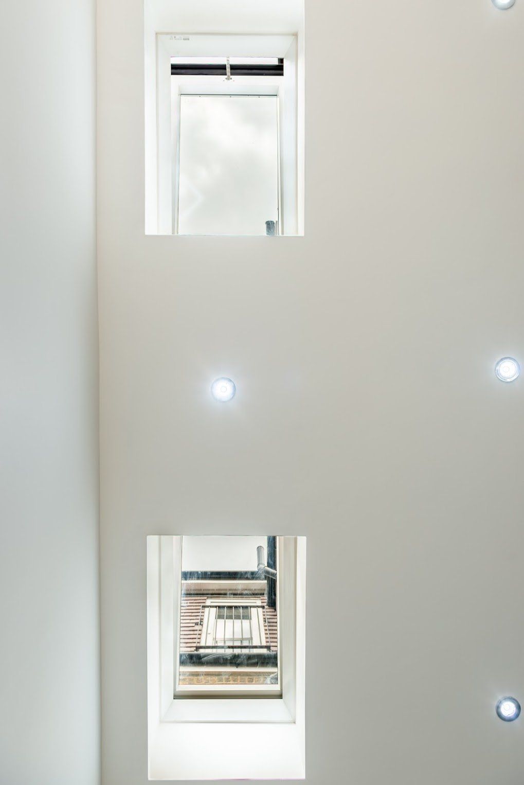 Interior shot of a skylight window in a loft conversion extension in Walthamstow by Ibex Builders.