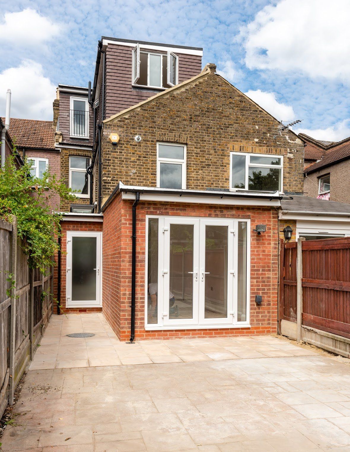 Exterior of a brick-built kitchen extension and loft conversion project in Walthamstow E17 by Ibex Builders.
