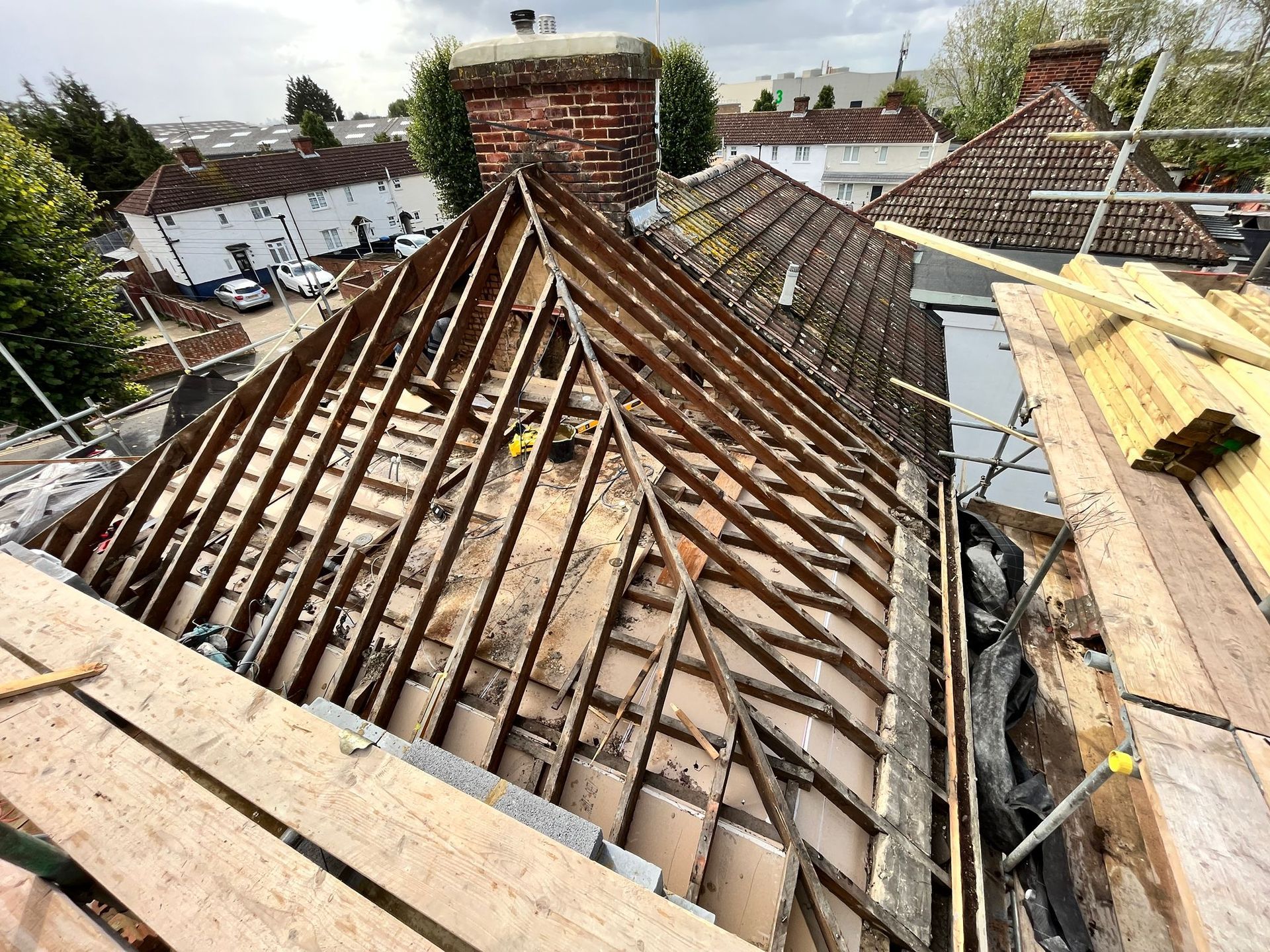 Ibex Builders constructing a complex timber roof frame for a Broadfield Sq loft conversion project.