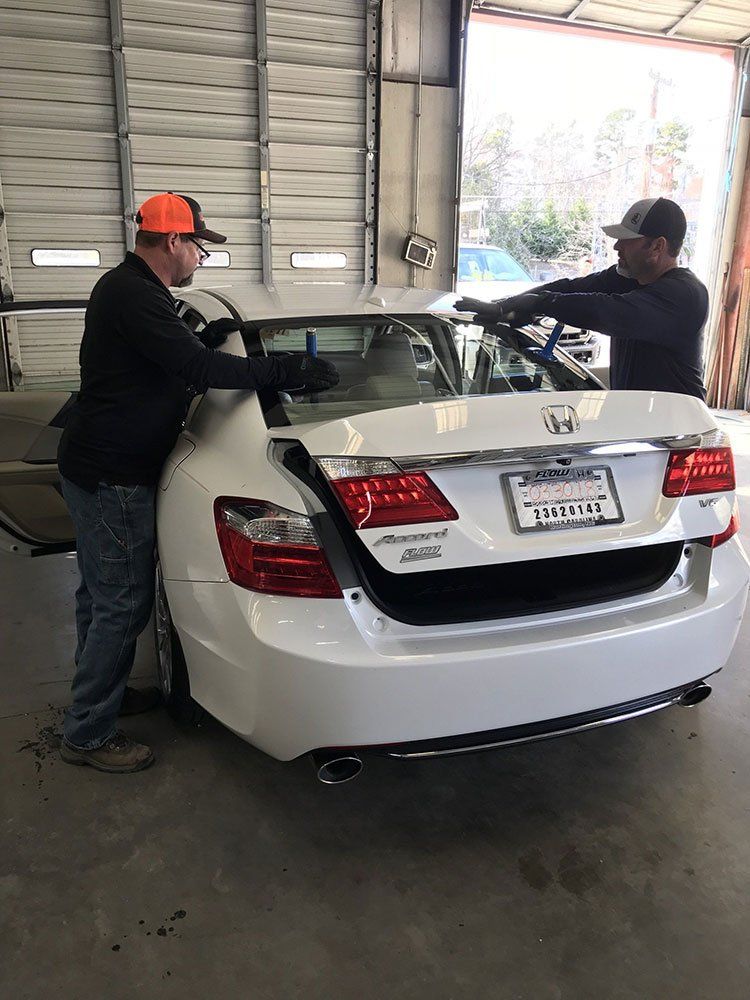 Workers Replacing the Windshield — Burlington, NC — Alamance Glass Inc.