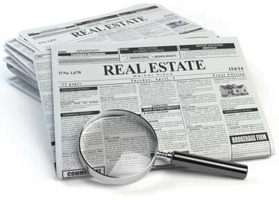 Homes For Sale — Newpaper with Magnifying Glass in Murray, KY