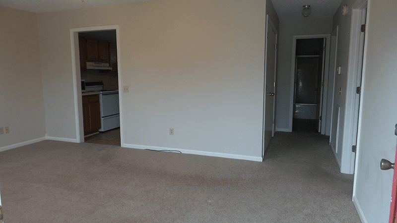House For Sale Project — Two Doors Open in an Empty Room in Murray, KY