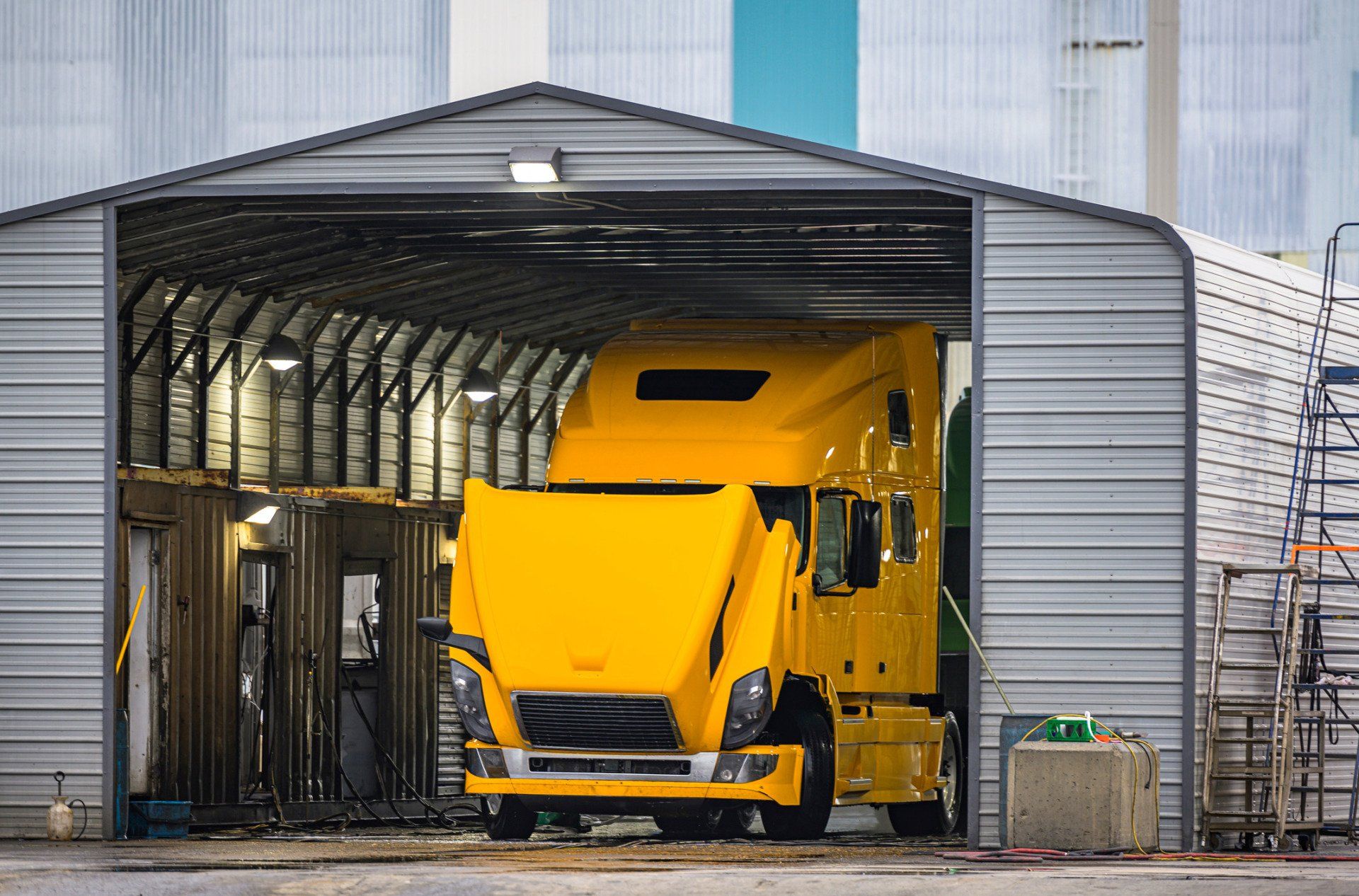 Yellow Semi Truck With Open Hood — Lincoln, NE — Long Shot Repair, LLC
