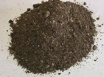 Pile of dark, granular compost.