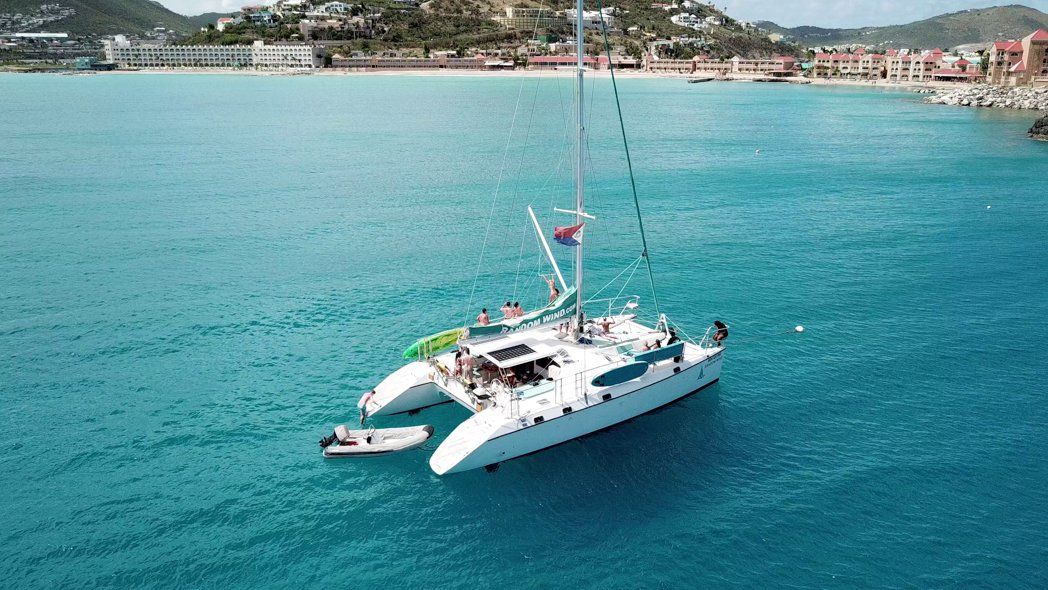 Random Wind catamaran yacht anchored at St Maarten