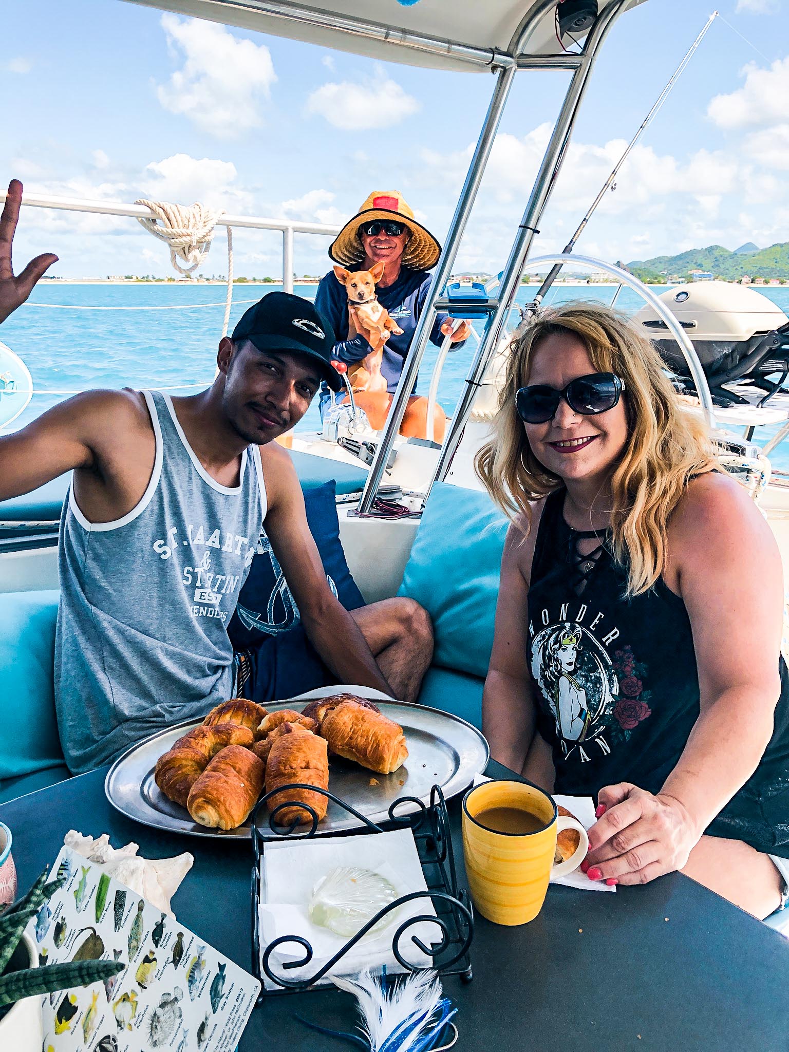 Group of people sitting in Random Wind yacht