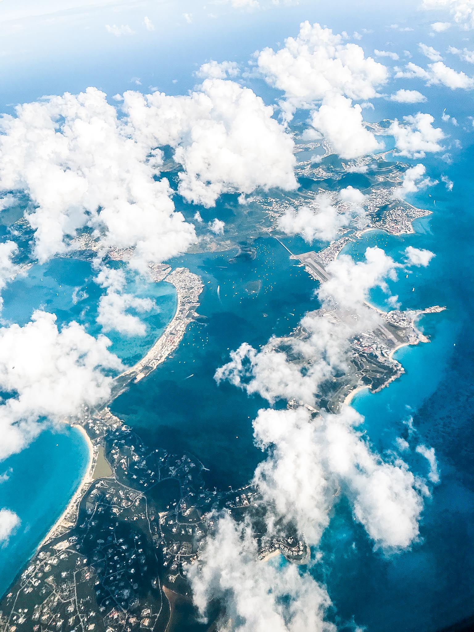 aerial view of sint maarten archipelago with clouds in the sky