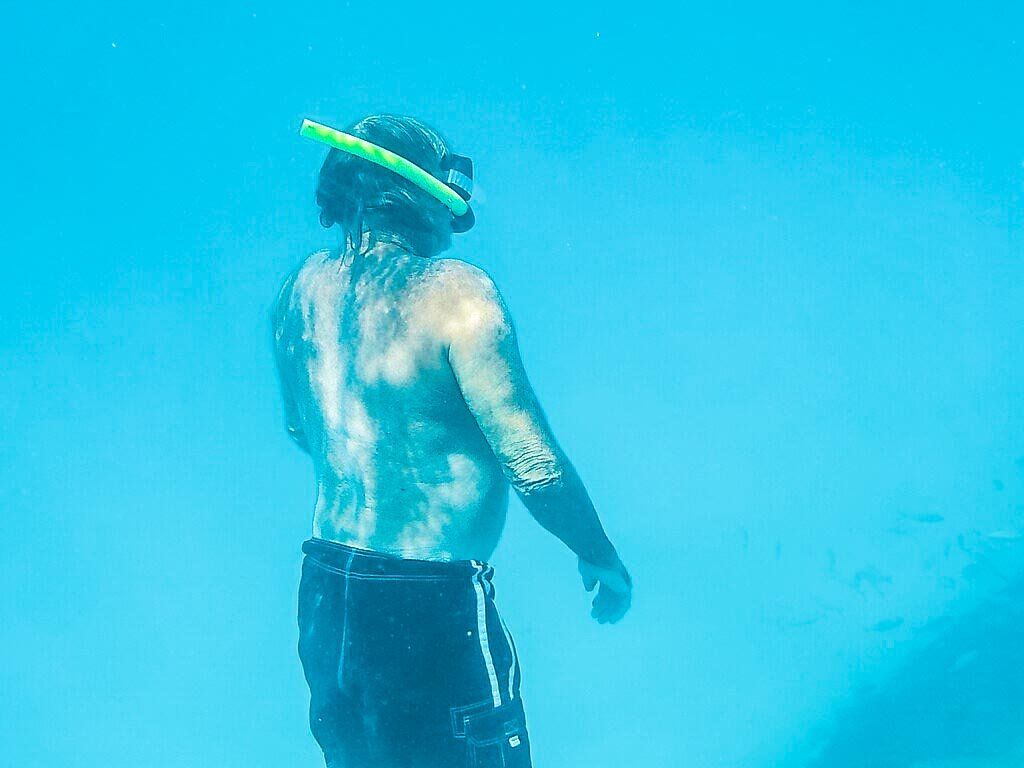 Man snorkeling in St Maarten