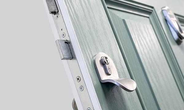 Composite door hardware Suffolk showing locks, handles, and hinges for front doors, with guidance on how to clean and maintain composite doors, low-maintenance GRP exterior door care, and proper upkeep of residential door fittings