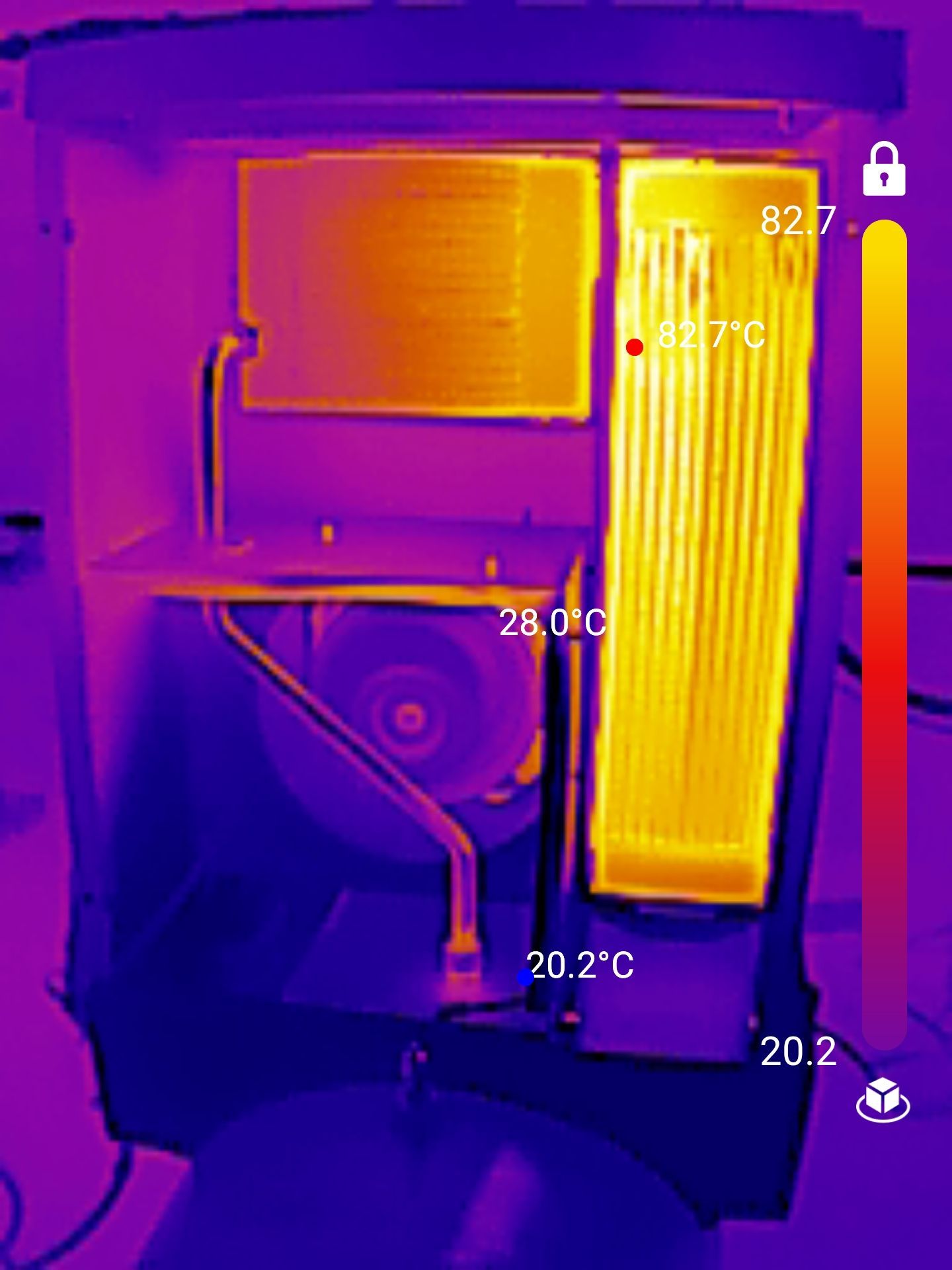 A thermal image of a refrigerator with a fan and a thermometer.