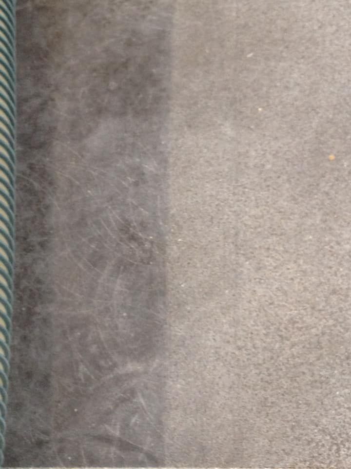 A before and after picture of a carpet being cleaned with a vacuum cleaner.