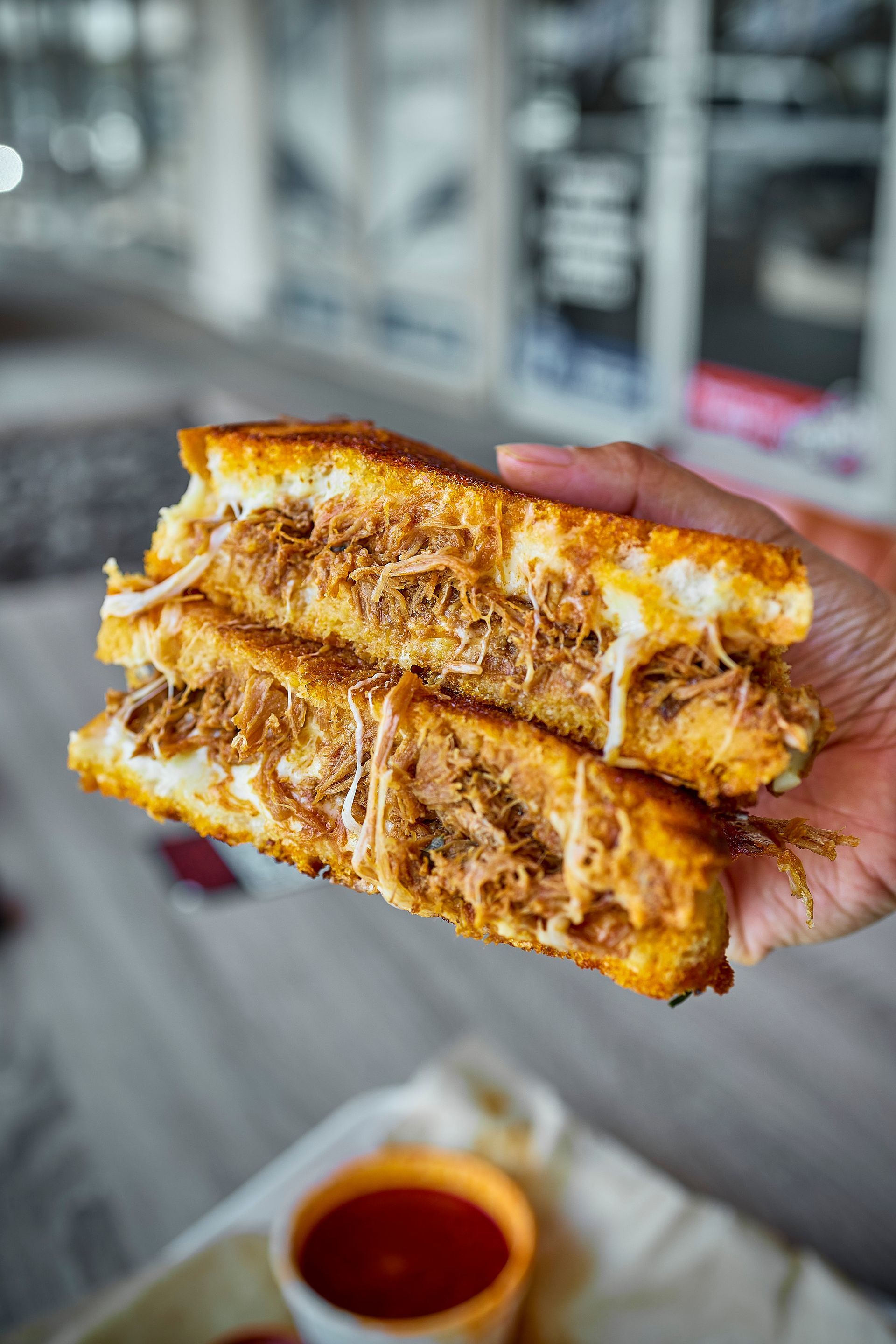 Grilled Cheese Birria from Mr. Birria. Oaxaca cheese , shredded beef, and consommé