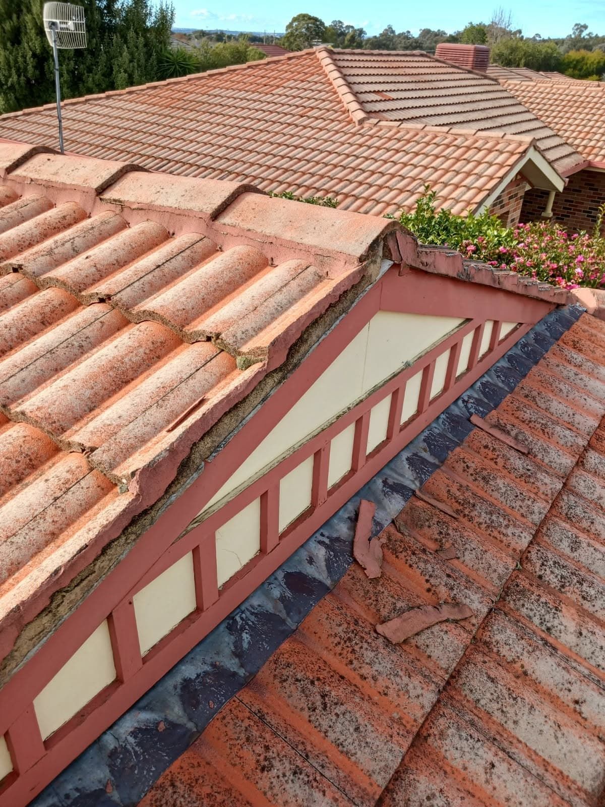 A Close Up of a Roof With a Triangle on It — Wagga Roof Repairs In Mount Austin, NSW