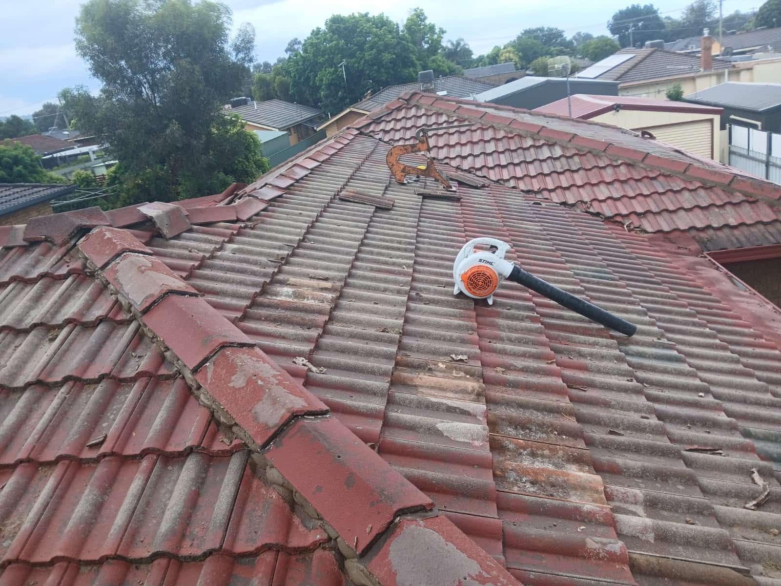 A Blower is Sitting on the Roof of a House — Wagga Roof Repairs In Mount Austin, NSW
