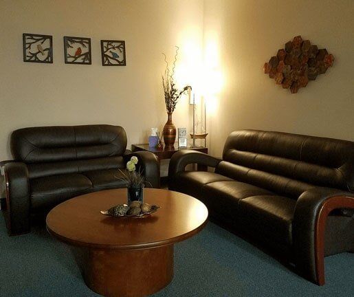 Couch with Table — Physical Therapy in Cedar Knolls, NJ