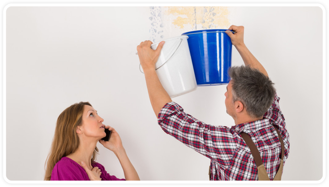 Man holding bucket & woman on phone in Macedonia Ohio