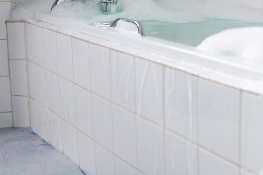 Overflowing bathtub water damage