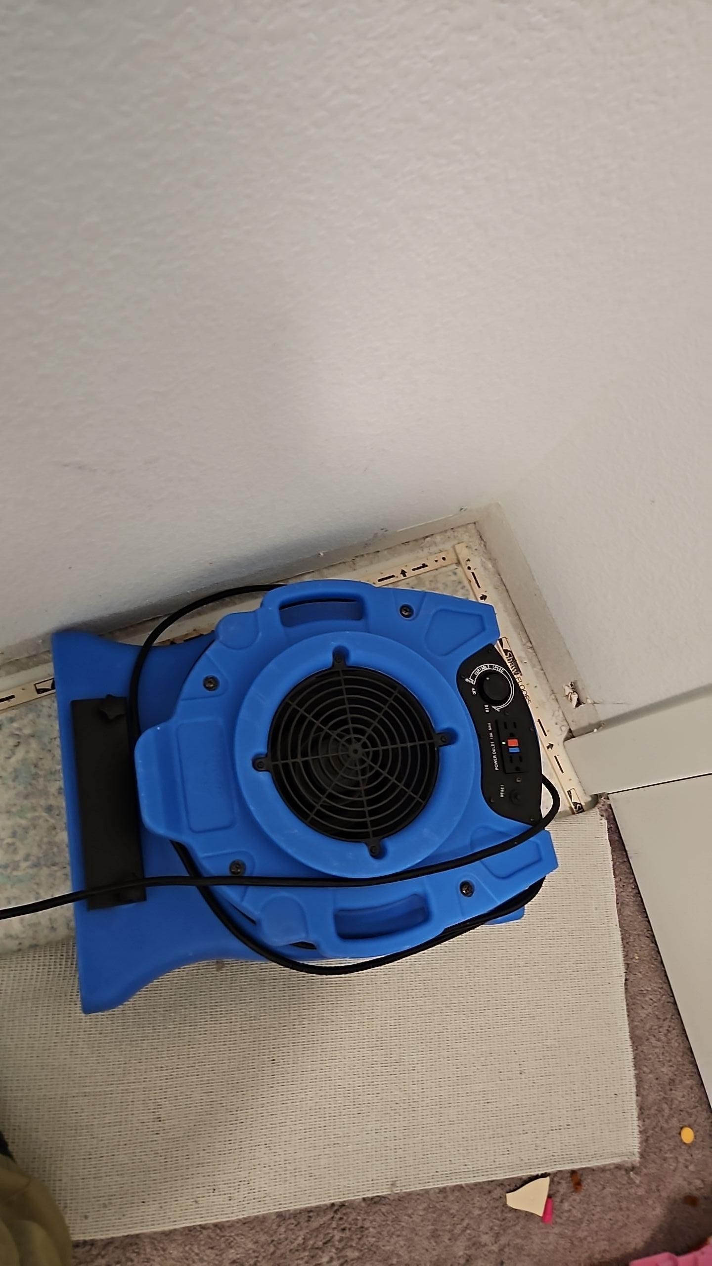 Bedroom baseboards removed to allow moisture to escape during drying process