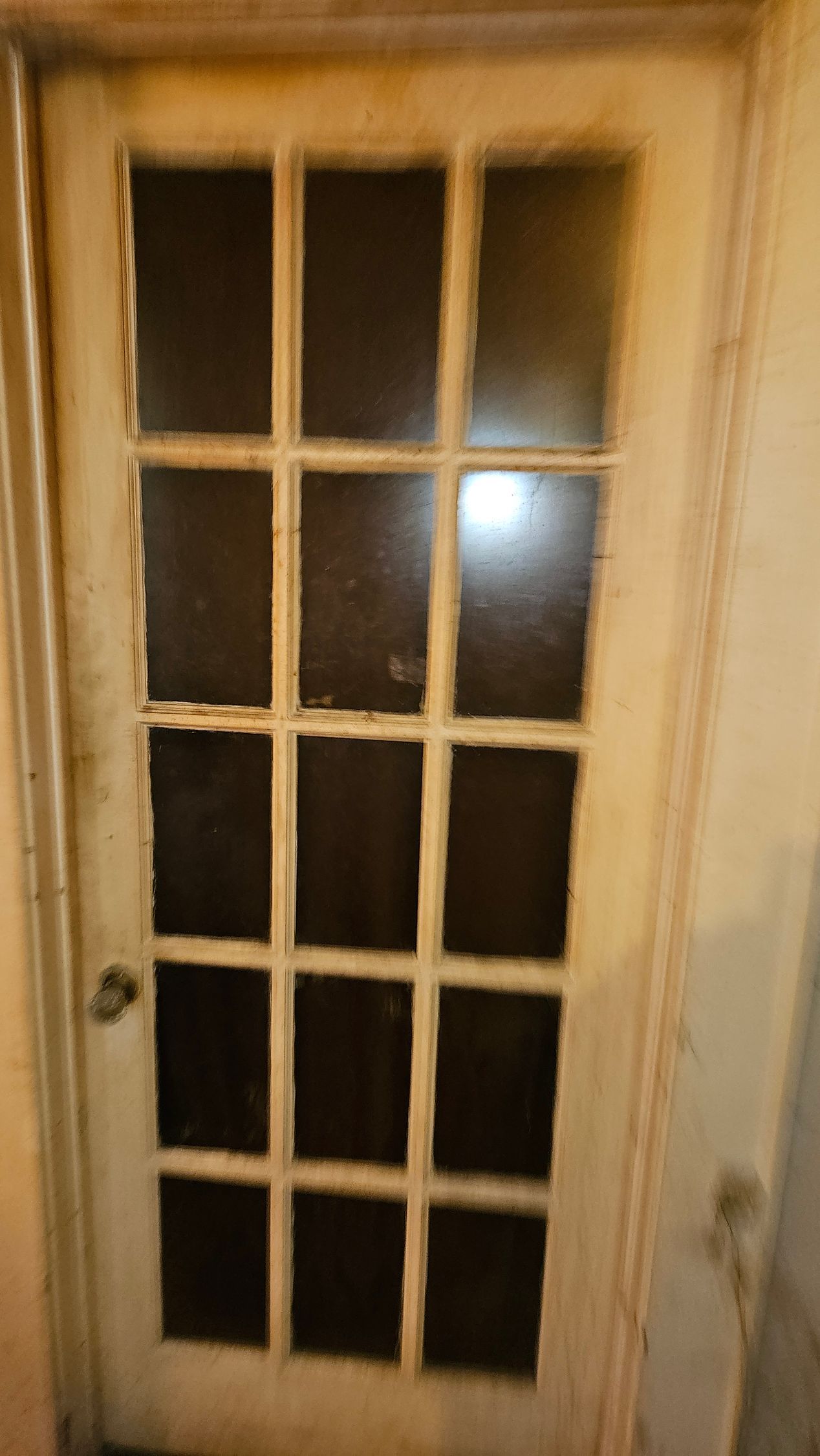 Interior of 100-year-old Waco home before clean-out showing accumulated debris