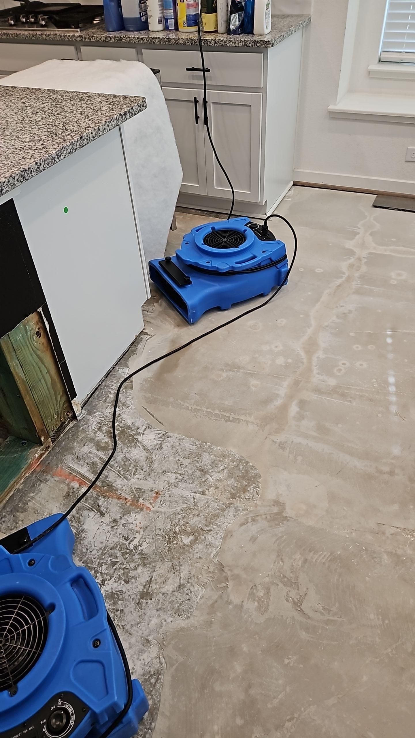 Kitchen island with flood cuts exposed during the drying phase