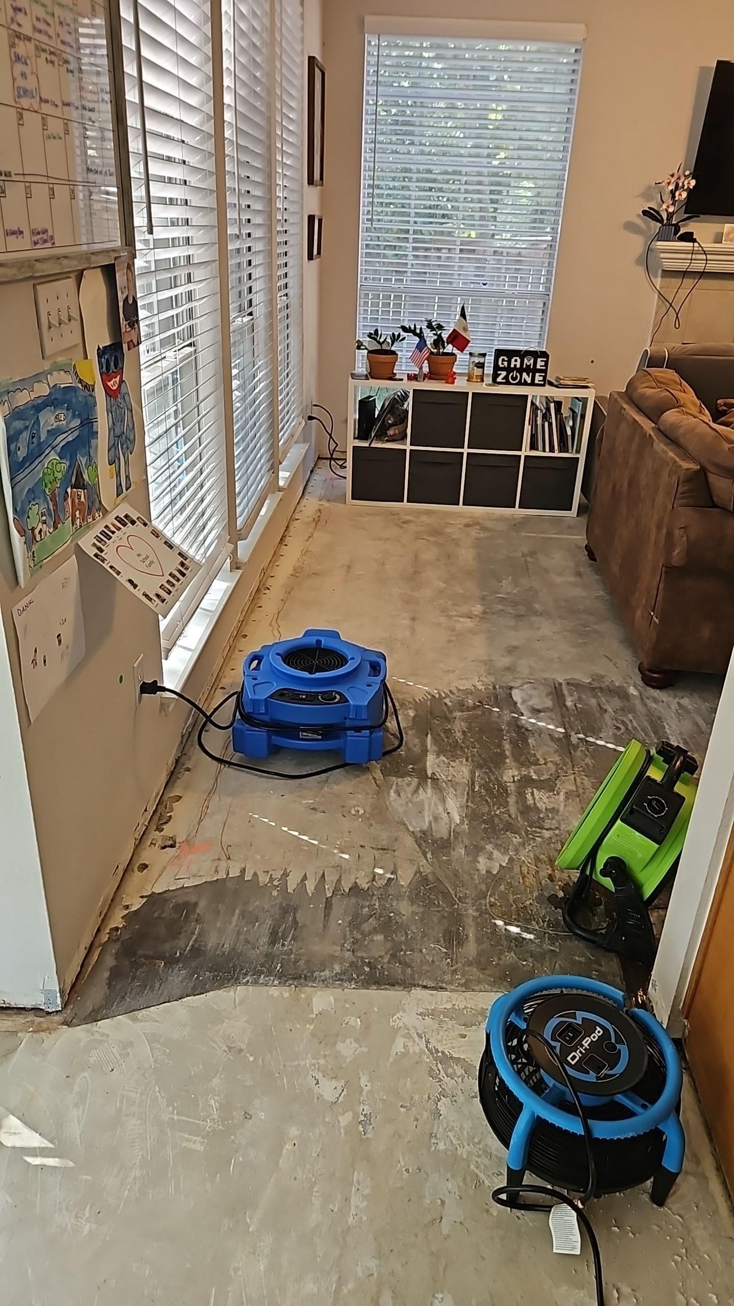 Living room water damage restoration in progress