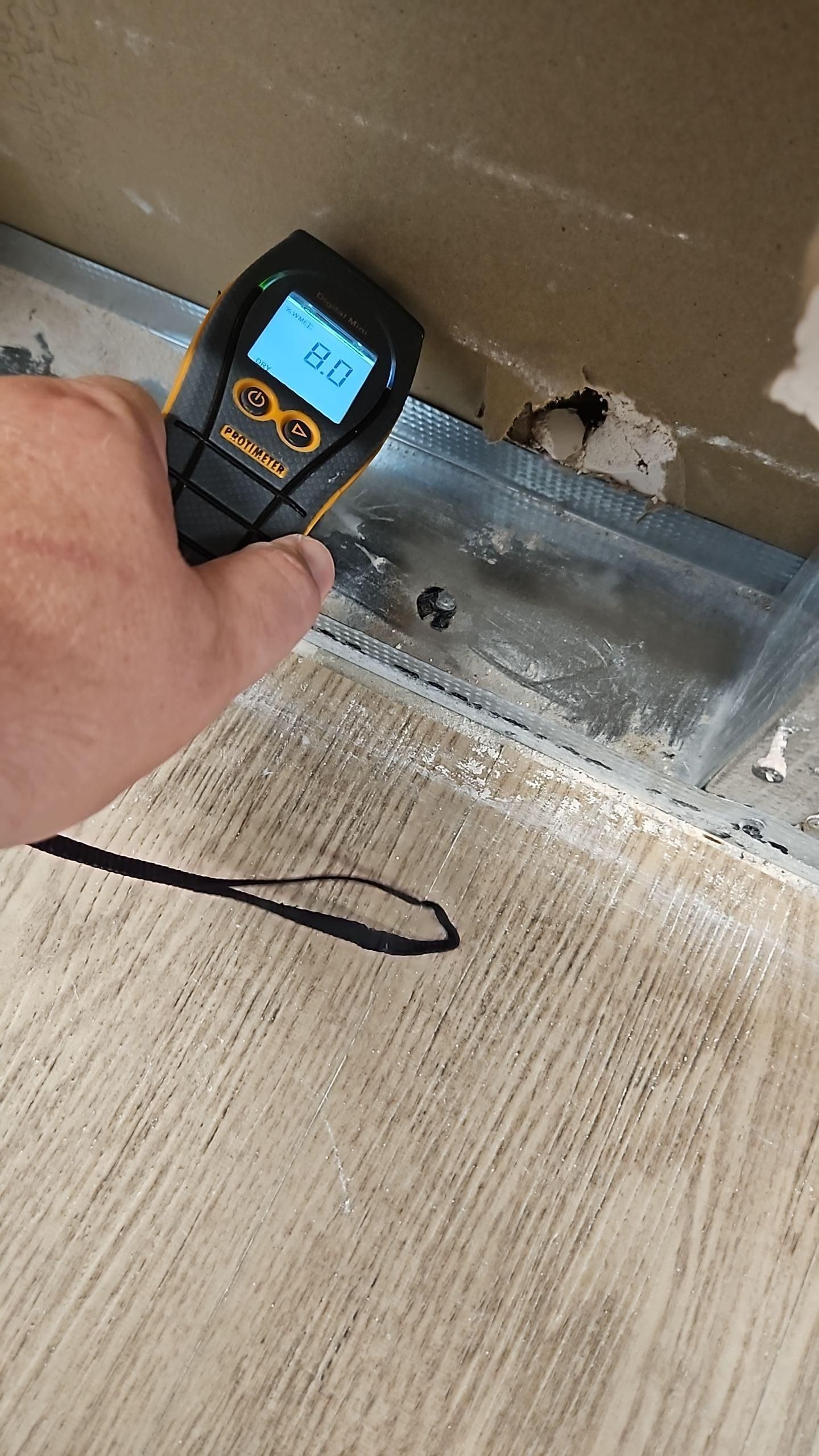 Moisture meter readings during water damage assessment