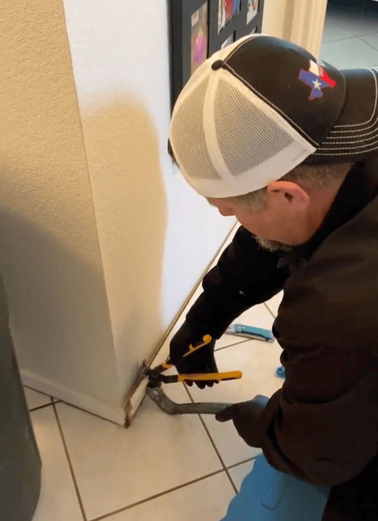 removing water damaged baseboards
