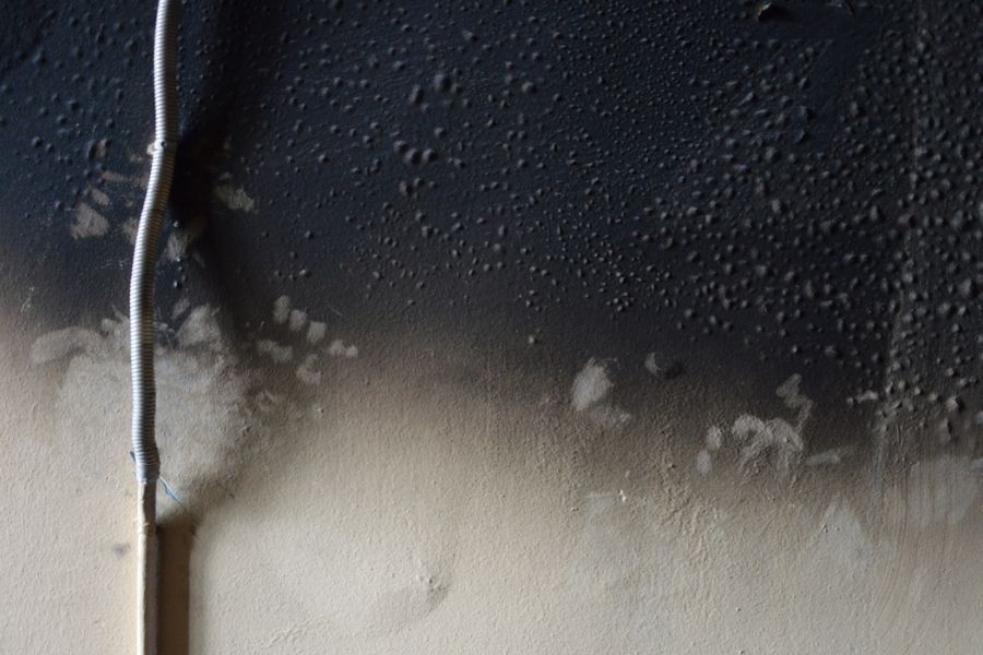 Soot stains on walls after house fire