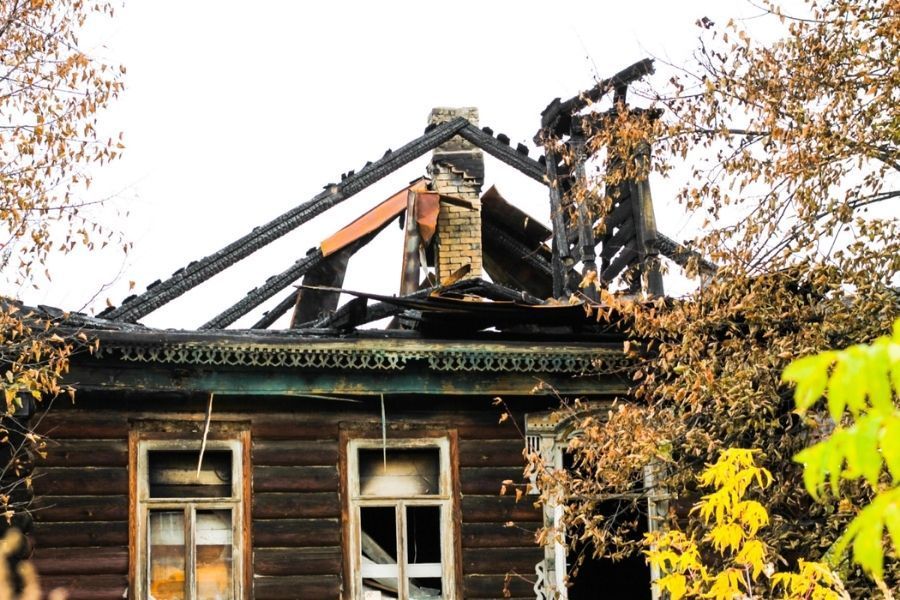 Structural repairs during fire damage restoration showing framing and drywall work