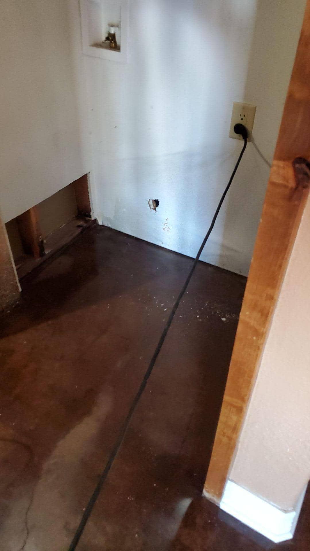 water damage behind fridge in groesbeck home