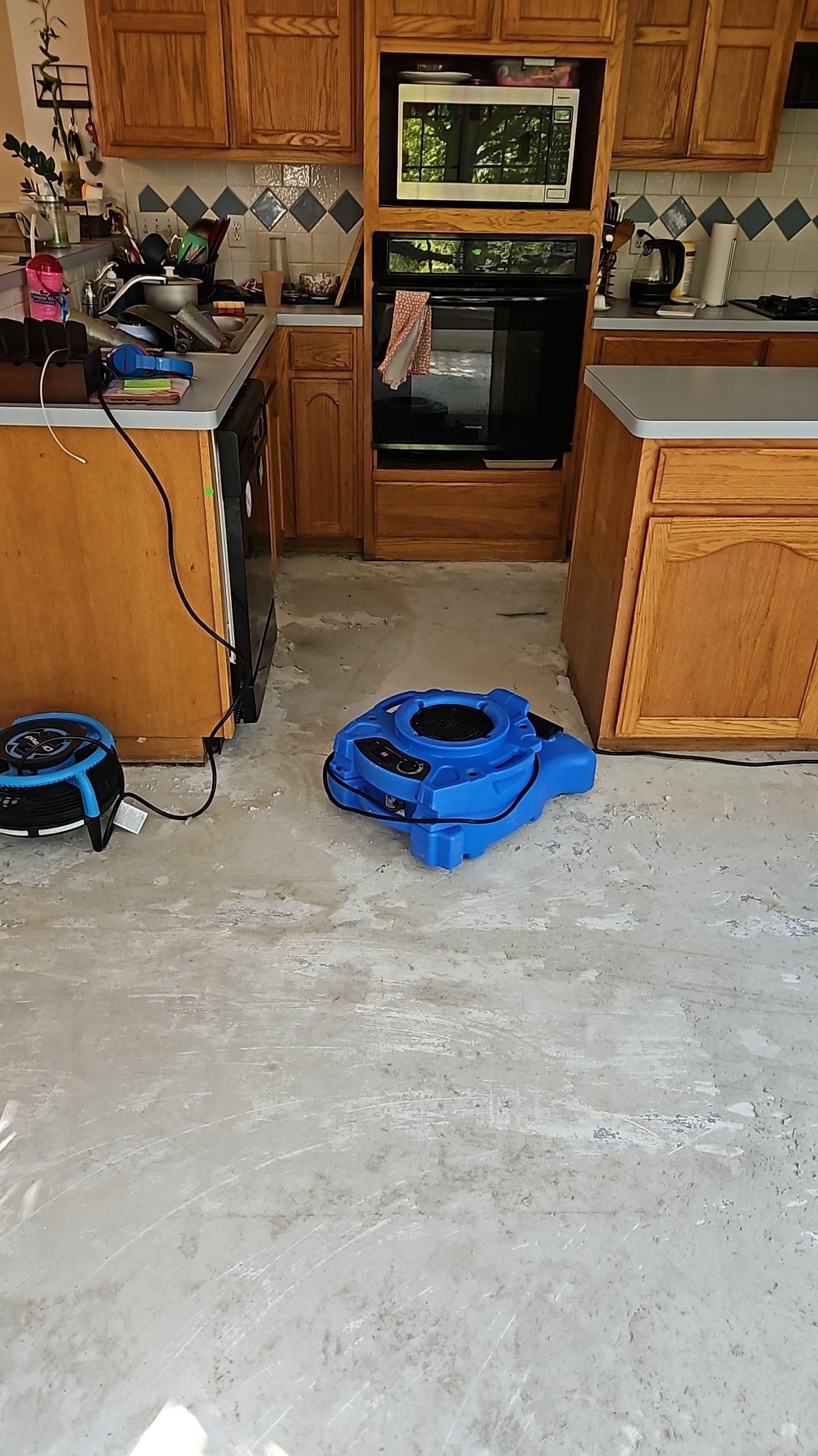 Flooring removal during water damage restoration project