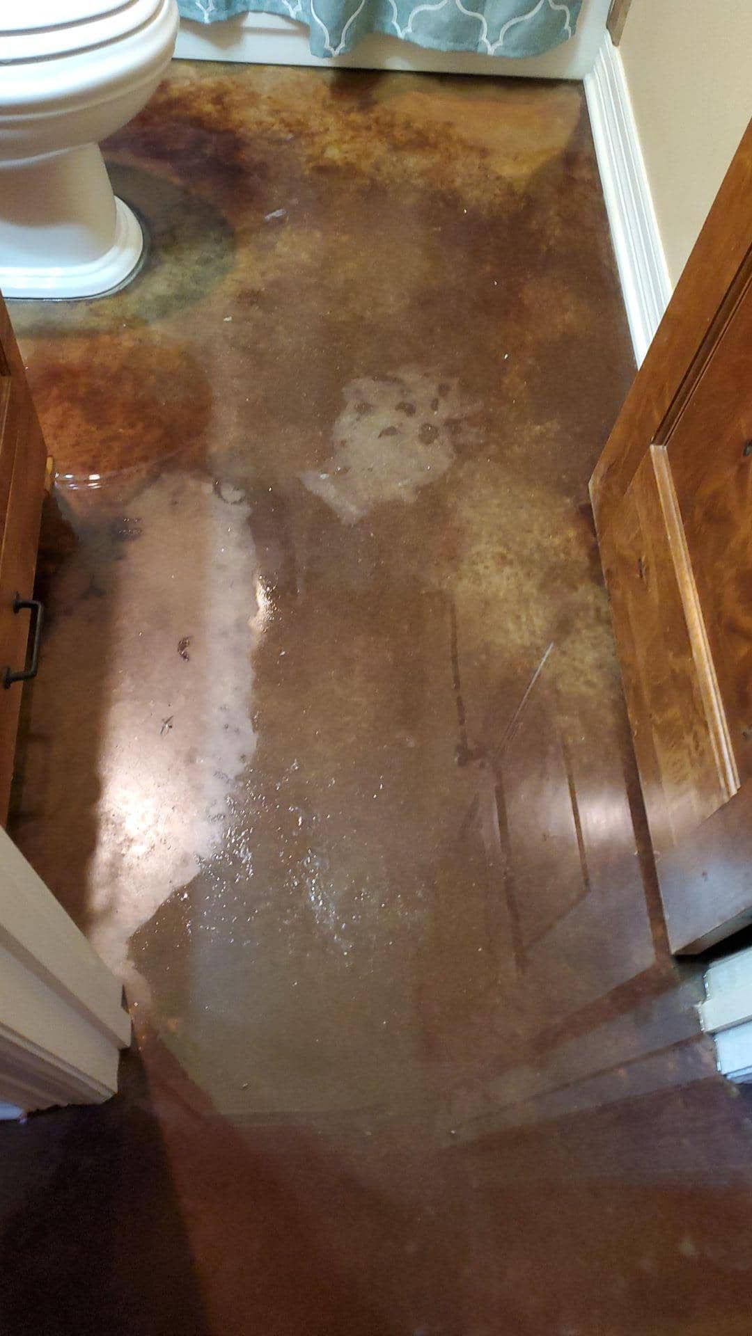 water damaged flooring in groesbeck home