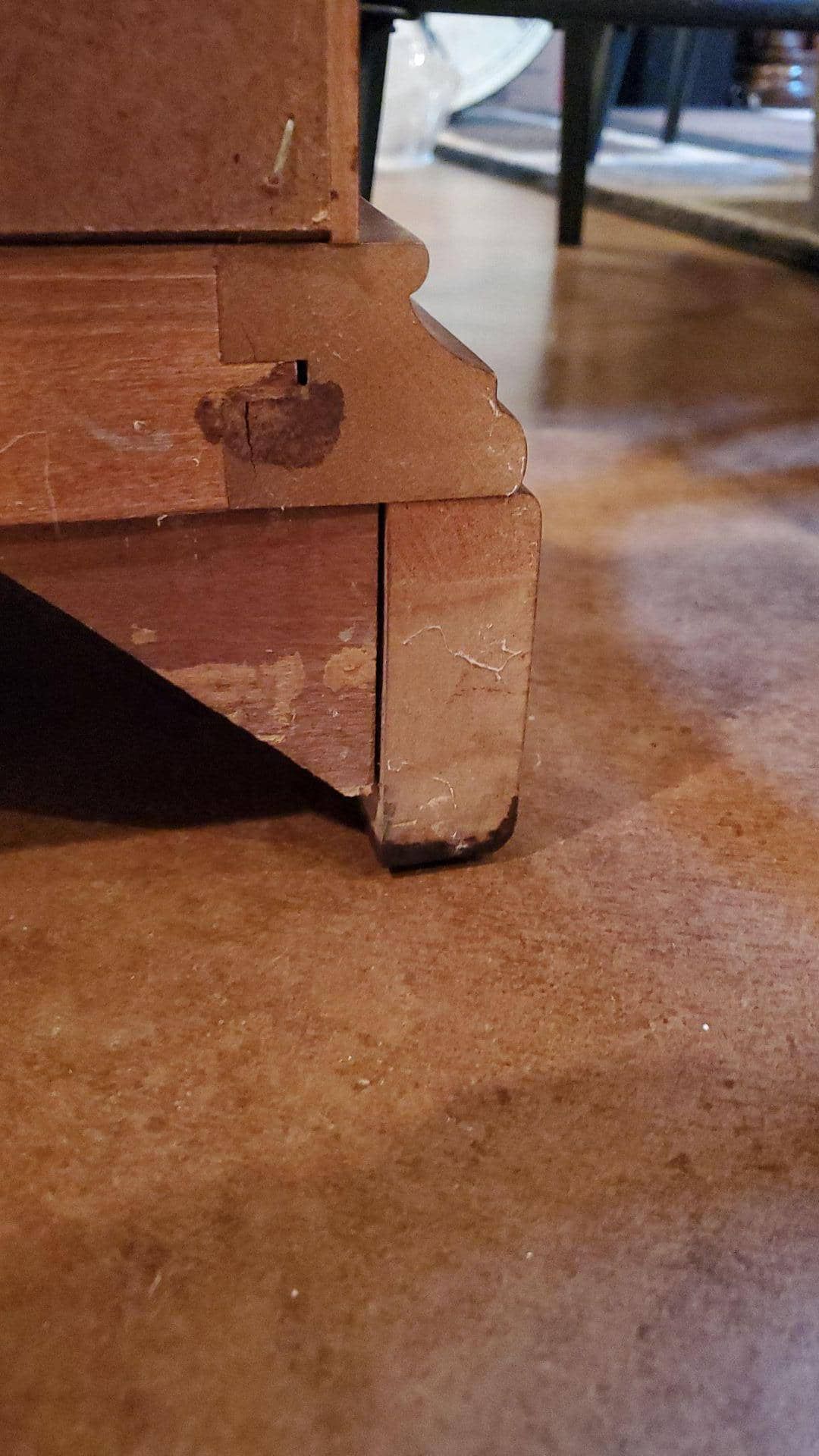 water damaged wood furniture in Groesbeck home