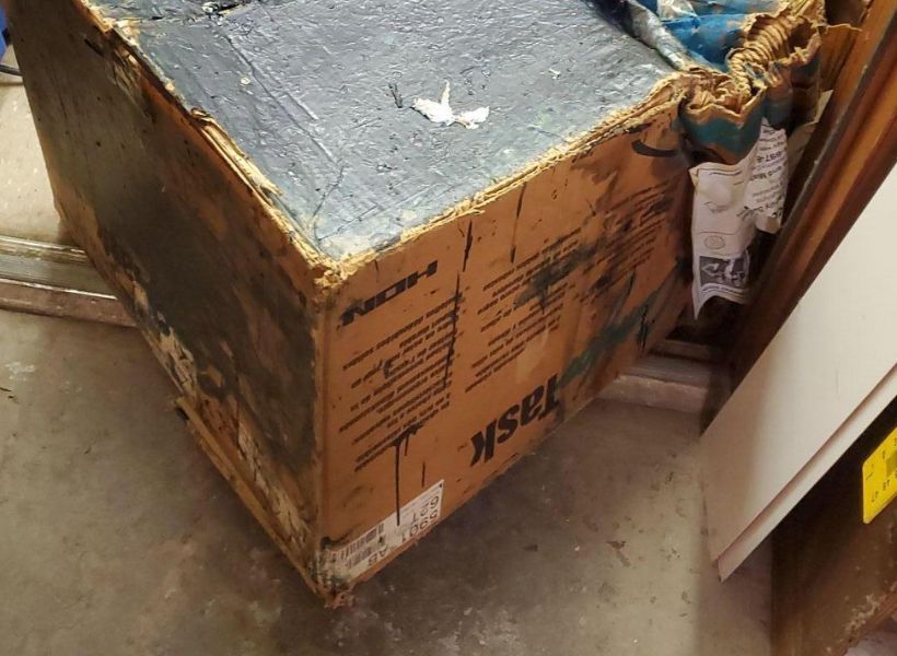 water damaged boxes  in cameron tx office