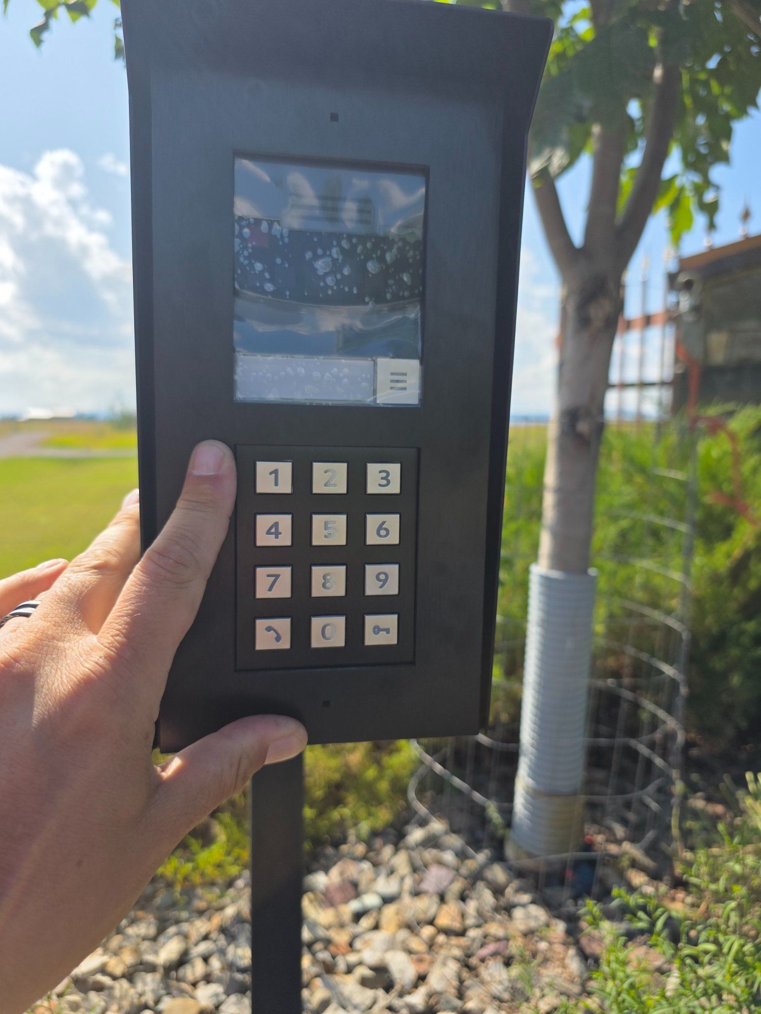 Gate intercom and keypad access control system installed at property entrance in Polson, Montana — Smart Home Solutions