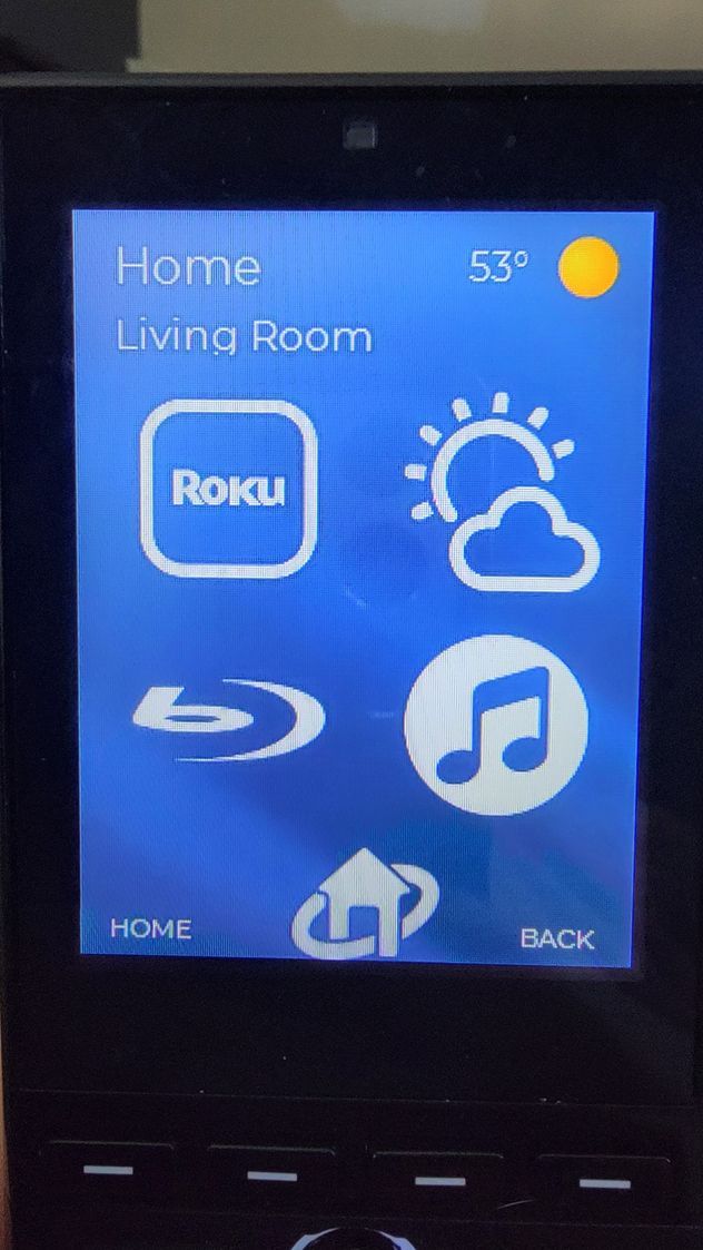 RTI home control screen for a living room with Roku, Blu-ray, music, and weather controls in Missoula, Montana